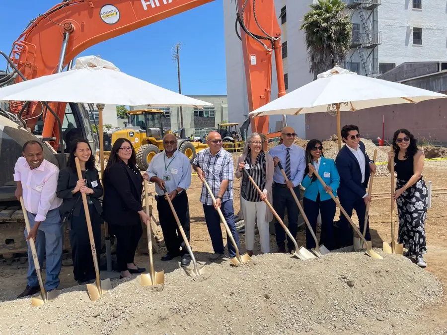 Groundbreaking ceremony with golden shovels.