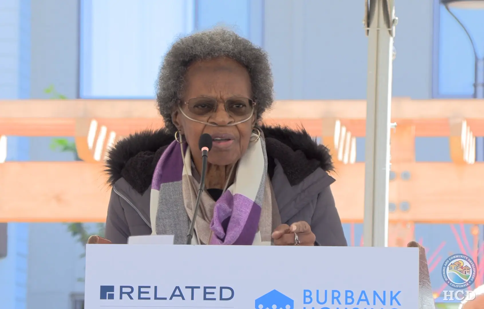 Resident Barbara speaking at Laurel at Perennial Park Grand Opening.