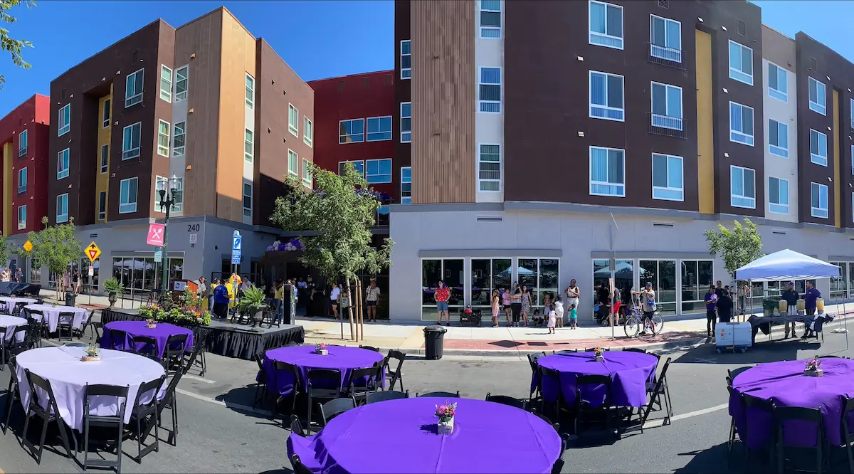 exterior of grand view village at grand opening celebration.